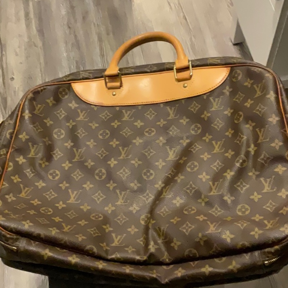 Louis Vuitton bag new but was sitting in storage